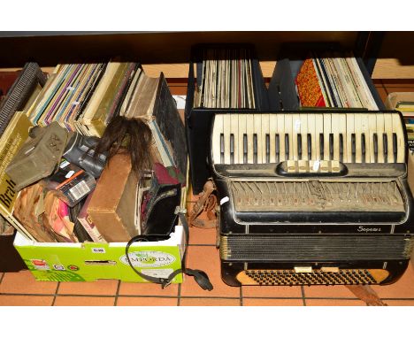 A SOPRANI PIANO ACCORDION, (distressed), together with various records, Holy Bible, cameras (Halina), etc
