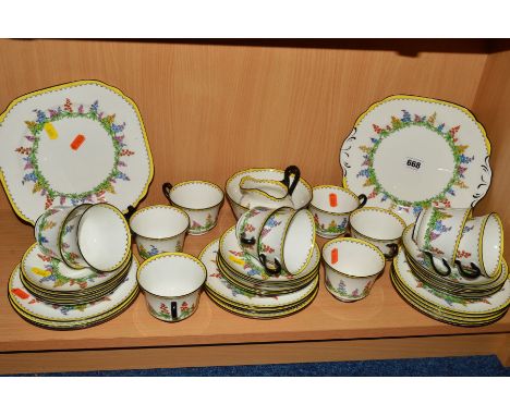 NEW CHELSEA 'KIRBY' TEAWARES, to include two cake plates, sugar bowl, milk jug, twelve tea cups (one hairline), twelve saucer