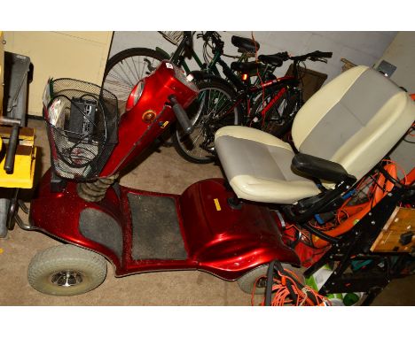 A RED ELECTRIC MOBILITY SCOOTER with battery pack (key)