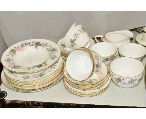 ROYAL WORCESTER 'JUNE GARLAND' TEAWARES, to include cake plate, six cups (one hairline), seven saucers, six side plates, milk