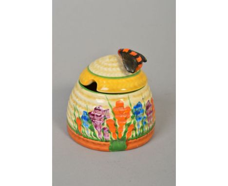 CLARICE CLIFF FOR NEWPORT POTTERY, a 'Crocus' beehive honey pot, printed factory marks, height approximately 7.5cm