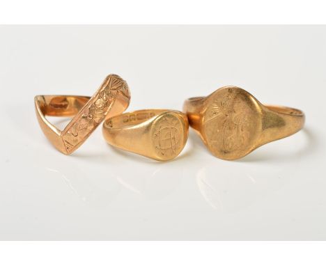 THREE 9CT GOLD RINGS, the first a V-shape band with engraved floral decoration, together with two signet rings, both with eng