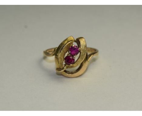 A 9ct Yellow Gold Set Ruby Dress Ring. Flower head Design. Fully Hallmarked. 4 grams. 