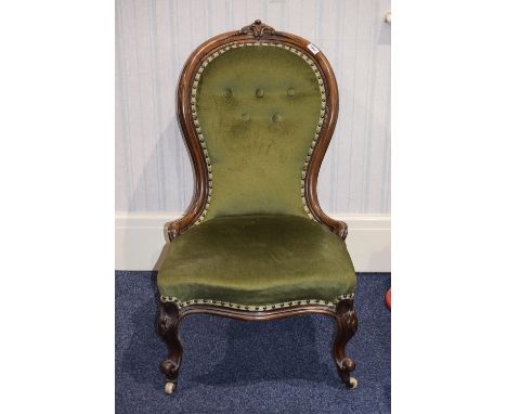 Victorian Nursing Chair, green upholstered fabric button back. Castor feet.