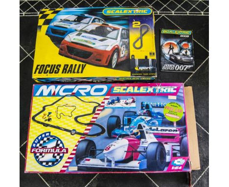 Scalextric Sport Advanced Track System, together with Micro Suer Formula track system. Both in original boxes.