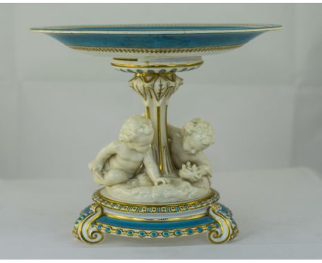 Minton - Porcelain Hand Painted Compote. The Pedestal with Two Cherub Figures to Sides, Raised on Neo Classical Inspired Trip