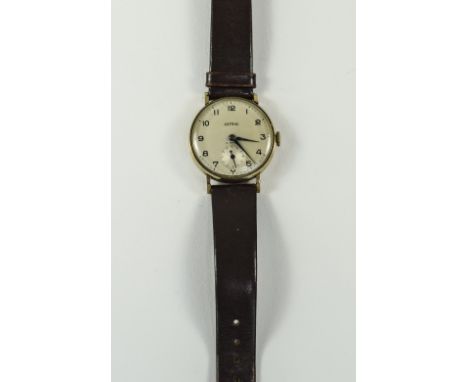 Astral 1950's Gents 9ct Gold Cased Mechanical Wristwatch, With Circular Enamel Dial, Fitted To A Leather Strap. 15 Jewels, Su