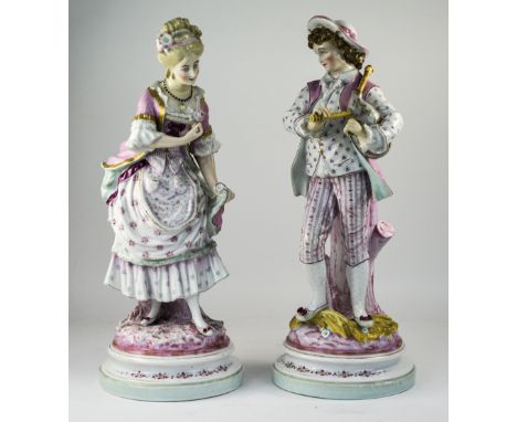A Very Fine Pair of 19th Century German Porcelain Figurines, Both Figures Dressed In 18th Century Costume and Raised on Circu