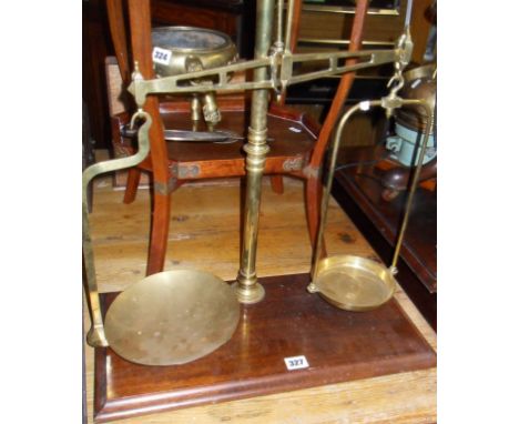 Victorian brass apothecary scales on mahogany base with weights