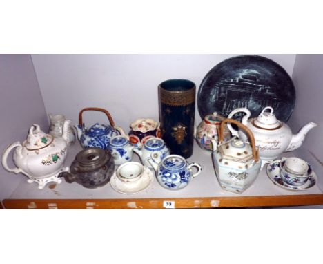 Collection of assorted china teapots including Chinese blue & white and another shelf of china & pottery