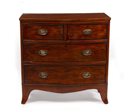 A GEORGE III SATINWOOD BOW FRONT CHEST OF DRAWERS with two short and two long drawers, having later brass handles and raised 