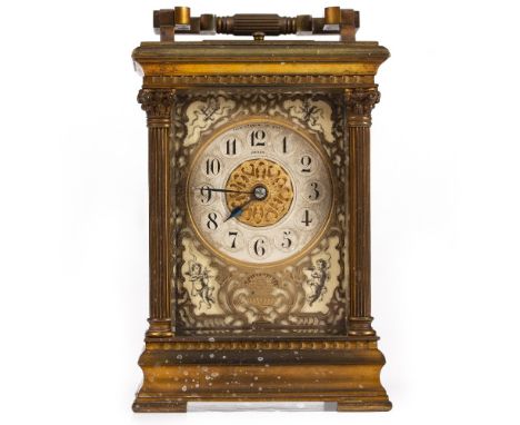 A LATE 19TH CENTURY FRENCH BRASS CARRIAGE CLOCK the back plate stamped 'EM &amp; Co' (E Mercier &amp; Co), the silvered dial 