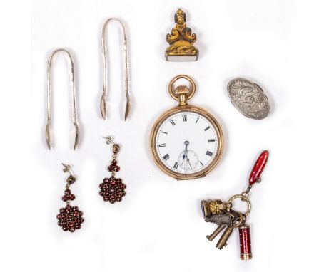 A GOLD PLATED POCKET WATCH a pair of silver 'toy' sugar tongs, a pair of 19th Century earrings, two seals, an enamel miniatur