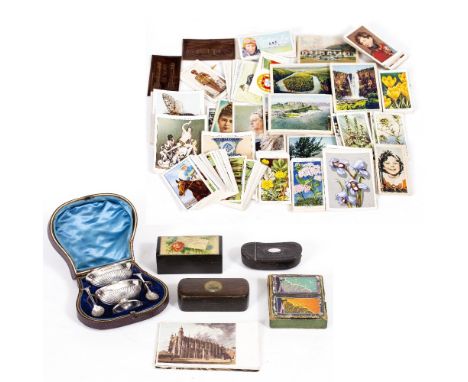 AN ANTIQUE CASED PAIR OF SALTS blue glass lining missing, each salt 7cm wide together with a horn snuff box, cigarette cards,