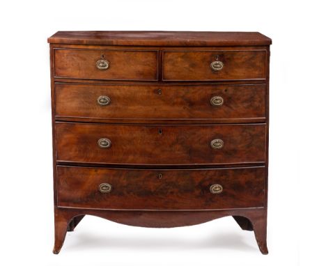 AN EARLY VICTORIAN MAHOGANY BOW FRONT CHEST OF TWO SHORT AND THREE LONG DRAWERS with brass oval ring handles and splayed brac