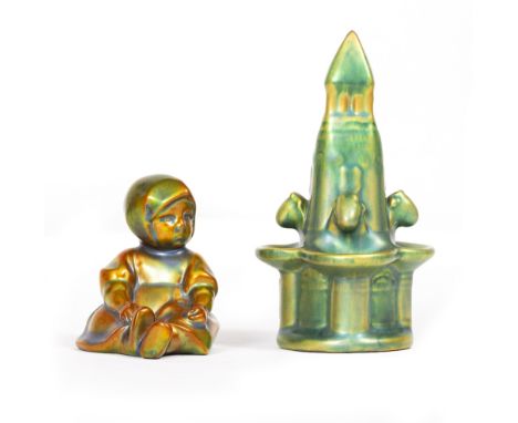 A ZSOLNAY PECS GREEN LUSTER PORCELAIN FIGURINE of a seated child, 6cm wide x 8cm high; a further Zsolnay Pecs green luster po