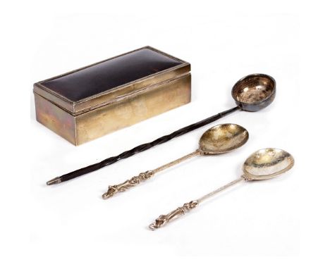A 19TH CENTURY WHITE METAL TODDY LADLE with a twisted baleen handle, 34cm in length; a pair of silver apostle spoons, each 27