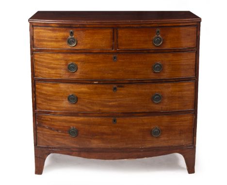 A 19TH CENTURY MAHOGANY BOW FRONTED CHEST OF TWO SHORT AND THREE LONG DRAWERS with later brass ring handles and raised on bra