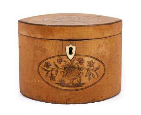 A GEORGE III SATINWOOD TEA CADDY of navette form with inlaid decoration, 15cm wide x 8.5cm deep x 11.5cm high Condition: hing