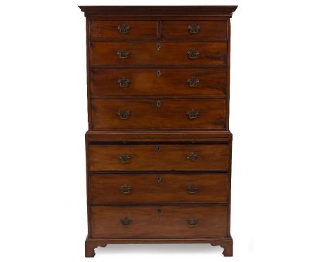 A 19TH CENTURY MAHOGANY CHEST ON CHEST with two short and six long drawers, with brass swan neck handles and raised on bracke