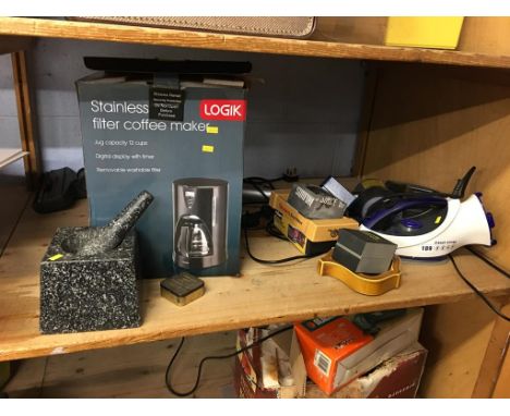 Shelf of assorted, including a coffee machine