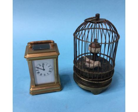Mini brass carriage clock and an automation bird cage clock (2)