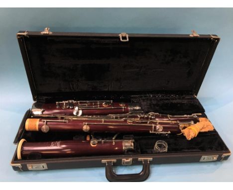 A Boosey and Hawkes, London Emperor Bassoon and fitted case