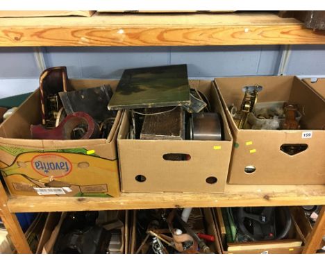Three boxes of clock parts