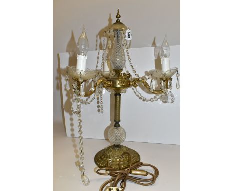 A CANDELABRUM-STYLE LAMP, of glass, brass and gilt metal construction, with three branches, glass sconces, suspended lustre d