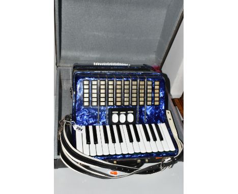 A DELICIA JUNIOR II PIANO ACCORDION, Royal Blue Lacquered Finish with travelling case