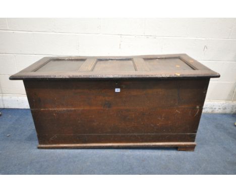 A GEORGIAN OAK PANELLED COFFER, width 130m x depth 58cm x height 66cm (condition report: multiple alterations, later front pa