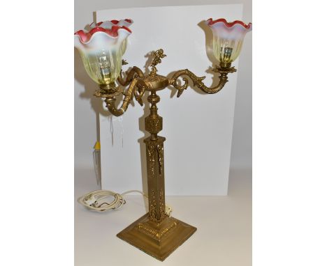 A CANDELABRUM-STYLE TABLE LAMP, with three foliate branches surrounding a central cherub figure, on a square column and base,