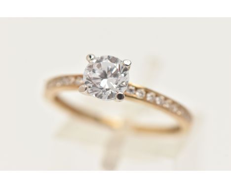 A 9CT GOLD GEM SET RING, set with a central circular cut, colourless cubic zirconia, in a four claw setting, cubic zirconia s
