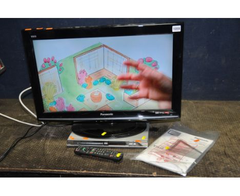 A PANASONIC TX-L26X10B 26in TV WITH REMOTE, manual and a Philips DVD player (no remote) (both PAT pass and working)