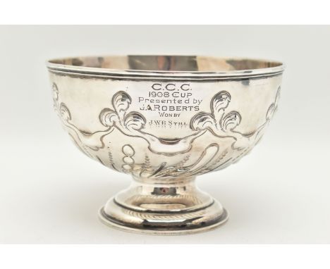 A LATE VICTORIAN SILVER PRESENTATION BOWL, embossed scrolling acanthus and stop reeded design, raised on a circular pedestal 