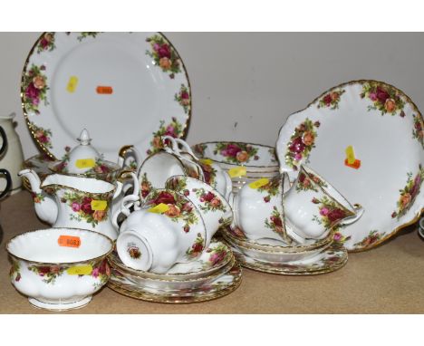 A COLLECTION OF ROYAL ALBERT 'OLD COUNTRY ROSES' DINNERWARE, comprising of a cake plate, six dinner plates, six side plates, 