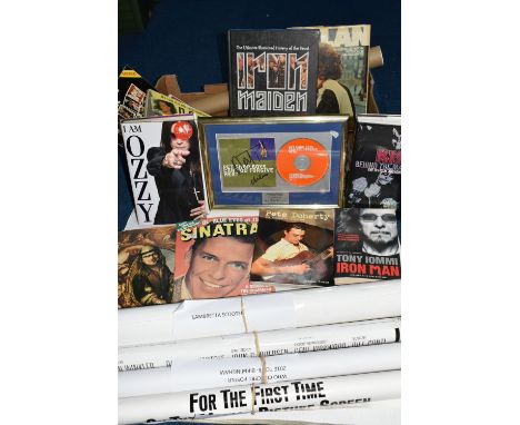 MUSIC &amp; FILM EPHEMERA, A collection of Books, Posters and a Signed CD Plaque, the books comprise Kiss Behind The Mask, I 