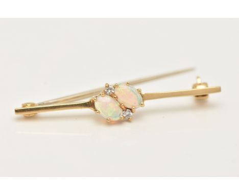 AN 18CT GOLD OPAL AND DIAMOND BROOCH, set with two oval cut white opals, each in six claw settings, with two small round bril