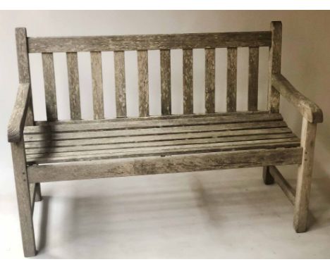 GARDEN BENCH, silvery weathered teak of slatted construction, 122cm W.
