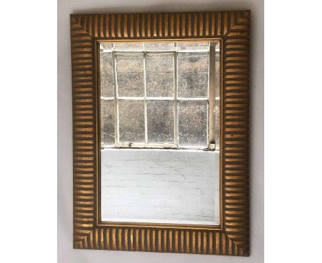 RICO WALL MIRROR, Art Deco style rectangular bevelled mirror in broad gilt and painted stripe frame, 123cm H x 89cm.