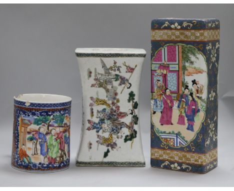 A Chinese ceramic head, two pillows and a Chinese mandarin cup