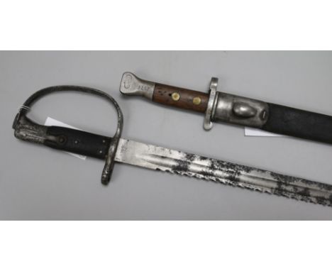 Two War Department bayonets, an 1888 pattern, the blade stamped WD below broad arrow and dated '96 and an 1879 pattern Martin