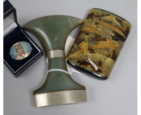 A Japanese tortoiseshell card case, gilt-decorated with a figure in a rickshaw and Mount Fuji and two other items, including 