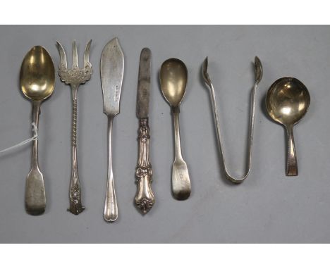 Seven items of silver cutlery, including a George III beaded caddy spoon, Thomas Wallis II, London 1792, 4.4oz. gross