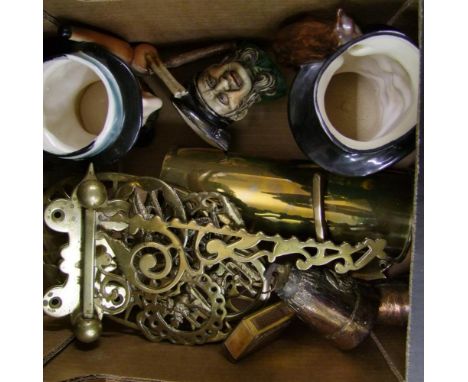 A mixed collection of items to include: horse brasses, brass bullet holder, ceramic character jugs, fan etc 