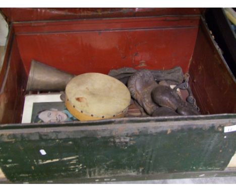 A vintage metal storage trunk: containing old boxing gloves, trouser press etc. 