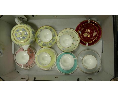 A Mixed collection of Wedgwood Tea Ware to include:  Floral decorated tea pot, various cups saucers etc 