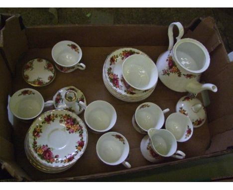 Floral bone china tea set: together with Royal Albert coasters and candlestick. 