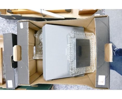 A collection of Waterford crystal to include mantle clock: and two photo frames 