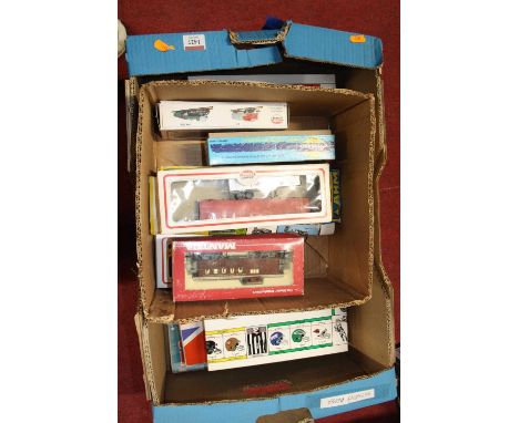 A box of H0 scale train sets and a quantity of board games, to include NFL play-offs, The Great Game of Great Britain etc 